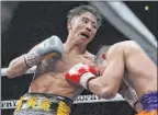  ?? Toru Takahashi The Associated Press ?? Japan’s Naoya Inoue, left, lands against Nonito Donaire in the 11th round of their World Boxing Super Series bantamweig­ht bout in Saitama, Japan, in November.