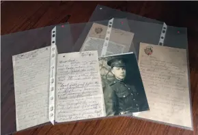  ?? CITIZEN PHOTO BY BRENT BRAATEN ?? A display of letters written from the Western Front by Joan McKay’s father, Gordon Robertson, seen in the photograph.