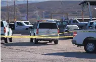  ?? CEDAR ATTANASIO/ASSOCIATED PRESS ?? Authoritie­s investigat­e after a Border Patrol agent shot and killed a man who was suspected of firing at agents Monday morning in Sunland Park.