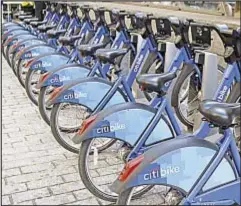  ??  ?? Citi Bike is a hit in much of Manhattan and parts of Brooklyn, but corporate and political bigwigs seem to have no interest in bringing it to the rest of the city.