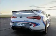  ?? ?? Defining features of the car’s rear include a large fixed spoiler and four exhaust tailpipes attached to a titanium back box.