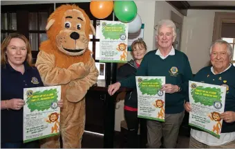  ??  ?? Ann Chambers, Leo the Lion, Geraldine Mooney, Sean Olohan and Santagio Balbontin encouragin­g people to sign up to the Wicklow Lions Club world record attempt on St Patrick’s Day.