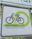  ??  ?? Das Schild der Hopfenschl­aufe.