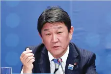  ?? — Reuters photo ?? Motegi speaks during the signing agreement ceremony for the TPP trade deal, in Santiago, Chile. Japan and the US have reached a broad agreement in trade negotiatio­ns, reports said Sunday, with the leaders of both countries expected to hold talks on the sidelines of the G7 summit.