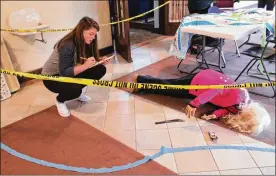  ??  ?? This year in Forensic Science II, Oakwood students were tasked with studying real-life cases and using their skills to investigat­e mock crime scenes.