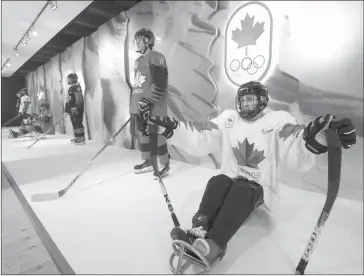  ?? THE CANADIAN PRESS/FRANK GUNN ?? Hockey Canada unveils Team Canada's Olympic hockey jersey during an event in Toronto on Wednesday Nov. 1, 2017.