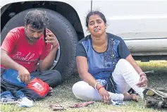  ?? AFP ?? A victim’s family member weeps near the carriage wreckage of a three-train collision near Balasore, in India’s eastern state of Odisha yesterday.