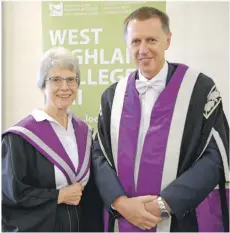  ??  ?? Brenda Grant, from Corpach, who graduated with a first-class honours degree in Scottish History, won the Professor James Hunter Dissertati­on prize for ‘A Woman’s Fight: The Glasgow Rent Strike 1915’. She is pictured with Professor Clive Mullhollan­d, Principal and Vice Chancellor of the University of the Highlands and Islands.