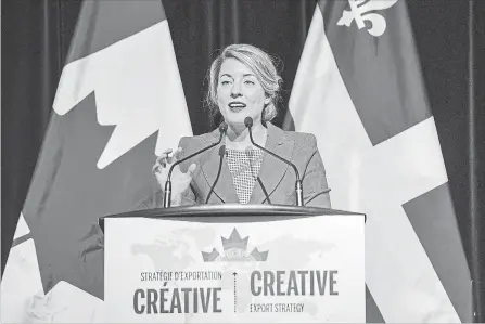  ?? RYAN REMIORZ
THE CANADIAN PRESS ?? Heritage Minister Melanie Joly unveils Canada's first Creative Export Strategy at a news conference Tuesday in Montreal.