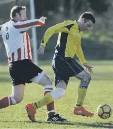  ??  ?? Over-40s action: Durham County (yellow) take on Wearmouth Old Boys