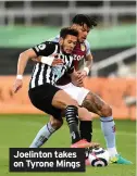  ??  ?? Joelinton takes on Tyrone Mings