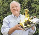  ?? AP FILE ?? Douglas Trumbull poses with the Film Vision Award Pardo at the 66th Locarno Internatio­nal Film Festival in 2013.