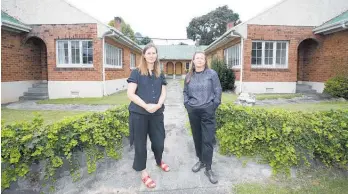  ??  ?? Architectu­ral designer Helen Beran and architect Felicity Christian are delighted that a plan for a hotel on the Almond Court flats site in Whanga¯ rei has fallen over. Now they want the unique flats are saved.