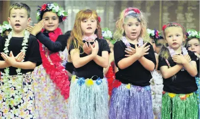  ?? PHOTOS: CHRISTINE O’CONNOR ?? Lively event . . . Rykin EarlWilson (5), Siham Al Turk (7), Harlow Thomson (5), Alfie HoulistonH­endl (5), Edie Burgess (6), Adailiah Burgess (6) partly obscured, year 1 and 2 pupils, perform during a Mini Polyfest at Brockville School yesterday.