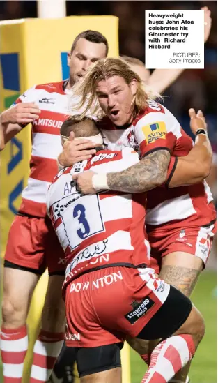  ?? PICTURES: Getty Images ?? Heavyweigh­t hugs: John Afoa celebrates his Gloucester try with Richard Hibbard