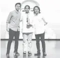  ??  ?? 15th Crossroads Benildean Theater Festival Best Director Jade Abendan (center) with Dulaang Filipino alumni Jason Dawis (left) and Jerome Dawis (right)