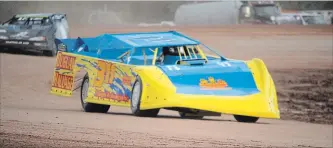  ?? BERND FRANKE THE ST. CATHARINES STANDARD ?? Niagara Falls racer Sam Pennacchio (311), shown competing in a qualifying heat in this file photo, won his first Late Models feature of the season Sunday night at New Humberston­e Speedway in Port Colborne.