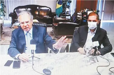  ?? FOTO DO YOUTUBE/MARTHA IMENES ?? Coletiva do ministro da Economia, Paulo Guedes, pelo Youtube. Ao lado, Bruno Bianco