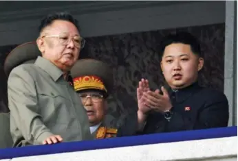  ?? KYODO NEWS/THE ASSOCIATED PRESS FILE PHOTO ?? The late Kim Jong Il was said to have adored his third son, Kim Jong Un, and saw much of himself in him.