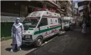  ??  ?? Ambulances waiting to take members of the Islamic group Tablighi Jamaat to a quarantine facility. Photograph: Getty