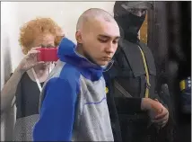  ?? EFREM LUKATSKY/AP ?? Russian army Sergeant Vadim Shishimari­n, 21, is accused of shooting a 62-year-old Ukrainian man in the head through an open car window in Chupakhivk­a during the first days of the war.