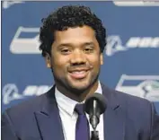  ?? Ted S. Warren Associated Press ?? SEAHAWKS quarterbac­k Russell Wilson recently signed a four-year, $140-million extension.