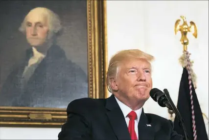  ?? Tom Brenner/The New York Times ?? President Donald Trump delivers a statement Monday in the Diplomatic Reception Room of the White House.