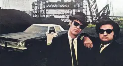  ?? NBC/UNIVERSAL/ LIBRARY OF CONGRESS ?? Dan Aykroyd, left, and John Belushi in the 1980 film “The Blues Brothers.” The film was added to the National Film Registry.