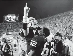  ?? AP FILE ?? Whitehall grad Matt Millen, a District 11 Hall of Fame inductee, is shown after winning a Super Bowl with the Raiders.