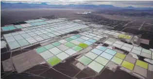  ?? PHOTO: REUTERS ?? The damage done . . . An aerial view shows the brine pools of SQM’s lithium mine on the Atacama salt flat in the Atacama desert of northern Chile.