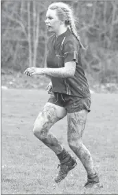 ?? CAROLE MORRIS-UNDERHILL ?? Like her teammates, Camryn Kleynhans, from Fall River, couldn’t escape being covered in mud April 26.