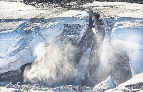  ?? PICTURE: GETTY ?? Meltwater flows from the Greenland ice sheet into the Baffin Bay near Pituffik, Greenland