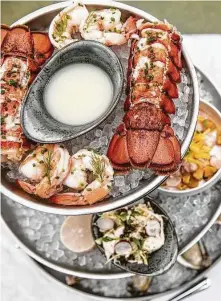  ?? Photos by Corin Michel ?? The Sporting Club offers starters including a seafood tower.