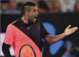  ?? ANDY BROWNBILL, THE ASSOCIATED PRESS ?? Australia’s Nick Kyrgios yells in frustratio­n during his fourth-round match against Bulgaria’s Grigor Dimitrov at the Australian Open on Sunday.