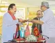  ?? — AFP ?? Sri Lankan President Gotabaya Rajapaksa (R) swears in elder brother Mahinda Rajapaksa (L) as Sri Lanka’s new Prime Minister in Colombo on Sunday.