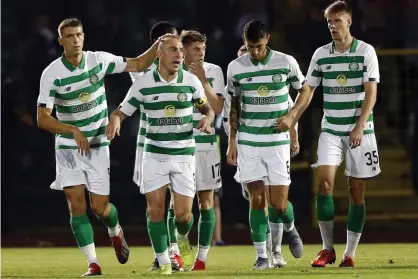  ??  ?? Celtic players celebrate after scoring against Sarajevo. Photograph: Fehim Demir/EPA