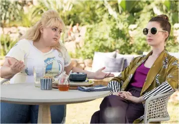  ??  ?? Show me the money... Penny (Rebel Wilson) and Josephine (Anne Hathaway) in ‘The Hustle’