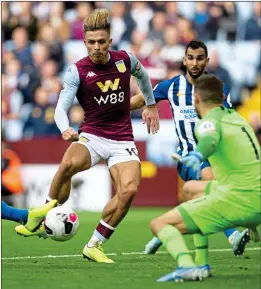  ??  ?? ALL-ACTION HERO: Jack Grealish beats Matt Ryan to equalise (above) and he also provided the assist for Matt Targett’s late winner for Villa