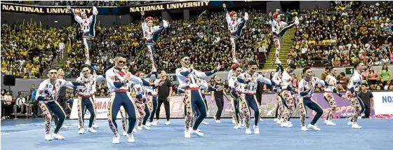  ??  ?? Sporting trappings that reference the Mexican Day of the Dead, the NU Pep Squad rises from the grave in a big way during the UAAP cheerdance competitio­n.