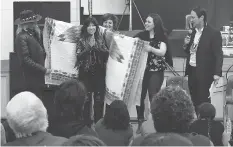  ?? RSO ?? During a tour of Saskatchew­an First Nations with the Regina Symphony Orchestra, Buffy Sainte-Marie visits the Cowessess First Nation where she received a star blanket from community members.