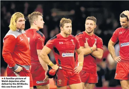  ??  ?? > A familiar picture of Welsh dejection after defeat by the All Blacks, this one from 2014