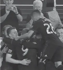  ?? PATRICK MCDERMOTT/GETTY ?? D.C. United players celebrate a goal last season against the Vancouver Whitecaps.