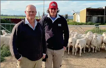  ??  ?? Rodney Vodusek and son Rudy pictured at Hareeba Park in Bundalong where their record breaking ewes were bred.
