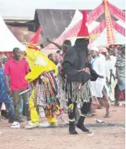  ??  ?? Ekpo masquerade from Arondizuog­u, Imo State perform