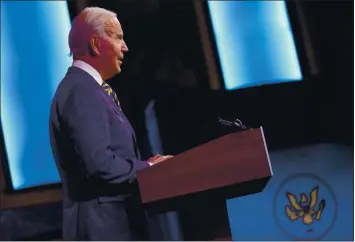  ?? ANDREW HARNIK — THE ASSOCIATED PRESS ?? President-elect Joe Biden warned during a speech at The Queen theater on Tuesday in Wilmington, Del., that Americans might not see improvemen­t in his team’s COVID-19 response until well into March.