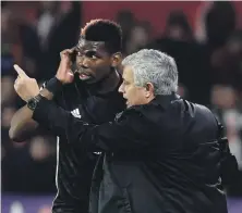  ?? AP ?? Jose Mourinho and Paul Pogba during Manchester United’s Uefa Champions League match at Sevilla last season, for which fans were charged €100 (Dh430) for a ticket