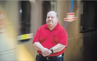  ?? TIJANA MARTIN
THE CANADIAN PRESS ?? Kevin Freeman, a volunteer with the TTC’s peer support program, poses for a photo at Wilson Station in Toronto on Thursday.