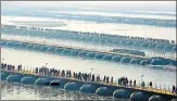  ?? HT FILE ?? Devotees arrive to take a holy dip at Sangam