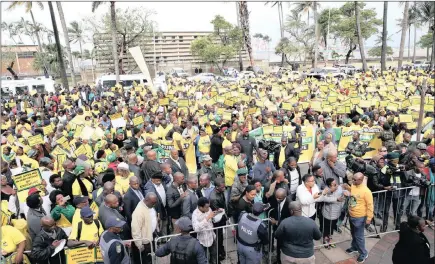  ?? PICTURE: DOCTOR NGCOBO ?? ANC members gather during a march in Durban on Monday calling for legislatio­n to restrict what they see as the judiciary interferin­g in the decisions and business of the executive.