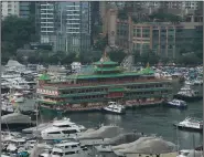  ?? (AP/Kin Cheung) ?? Hong Kong’s iconic Jumbo Floating Restaurant is towed away in Hong Kong, last week.